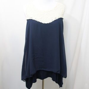 Le Rouge navy blue sleeveless top.
